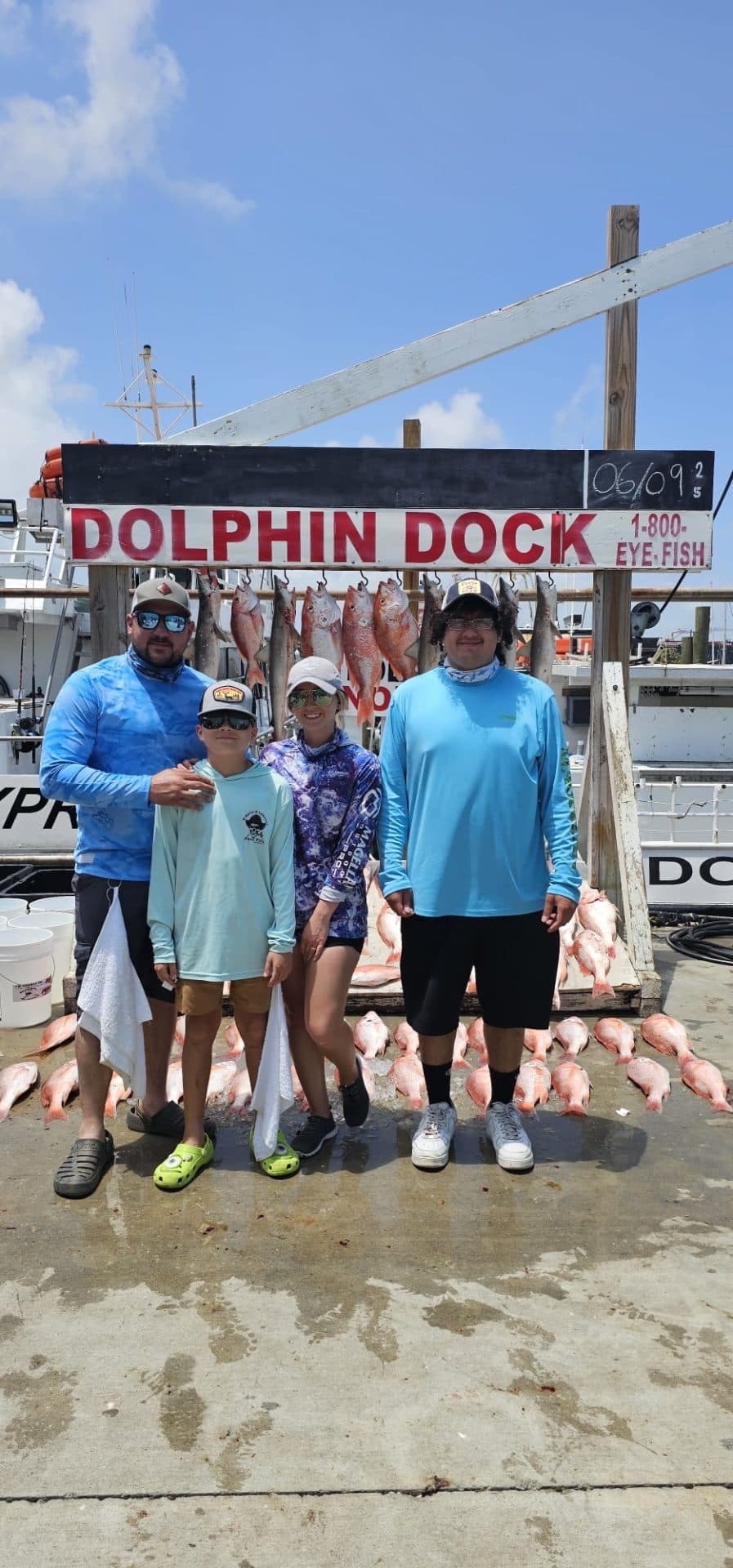 Two young anglers with fish caught on a Dolphin Dock trip