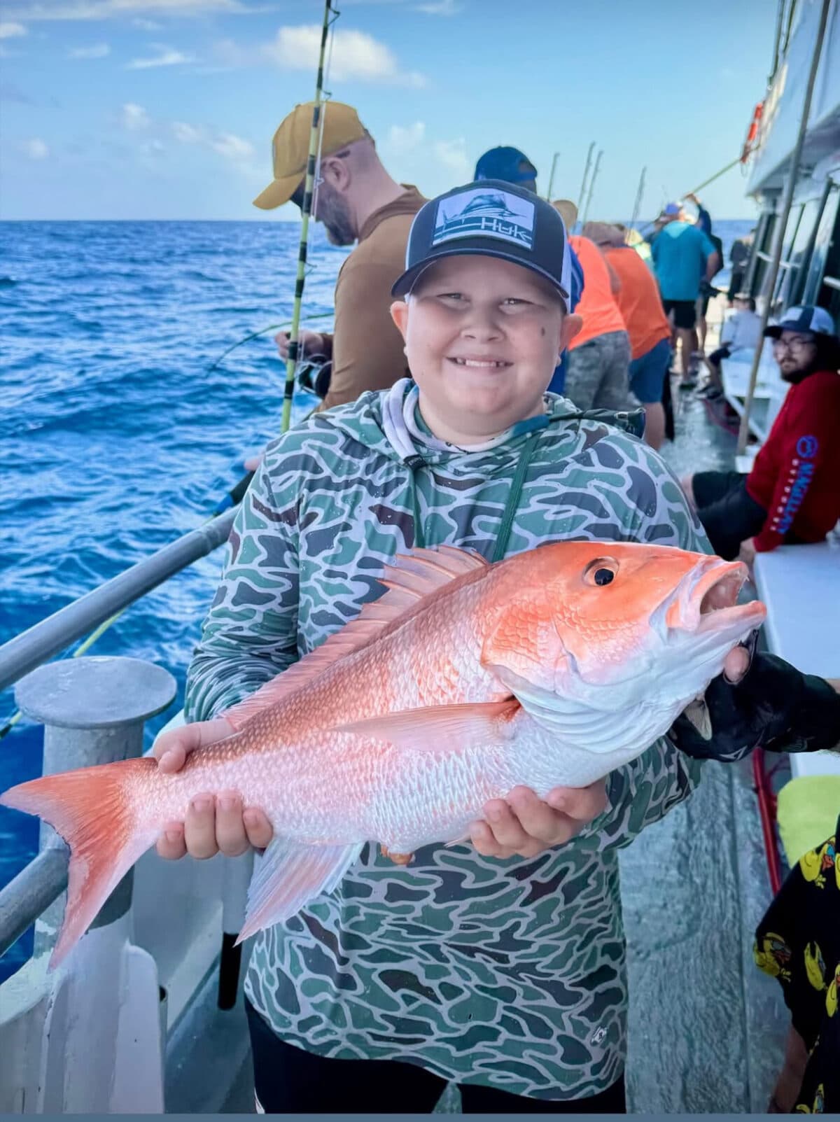 A group back at the dock with their catch after an offshore trip